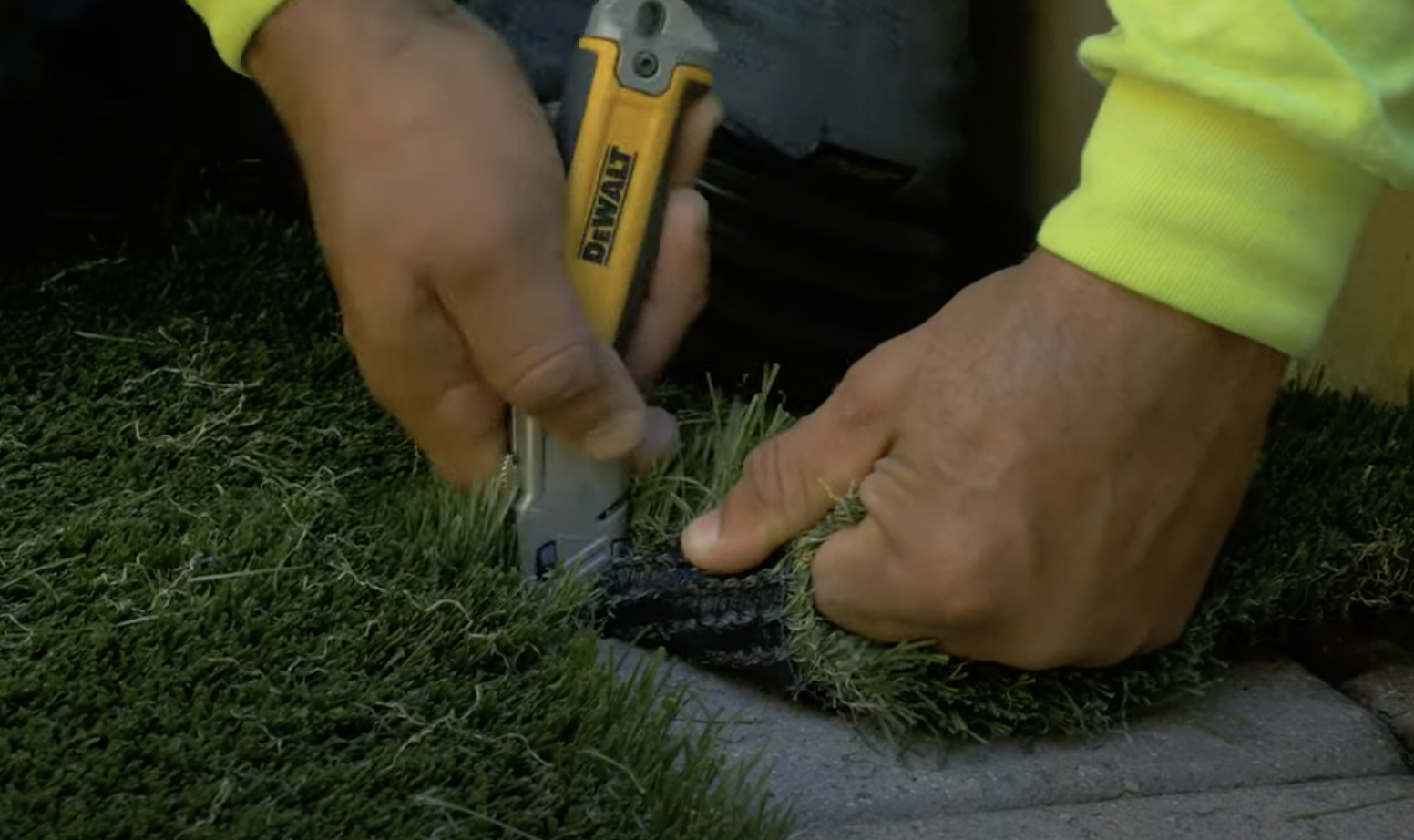 Our guys installing turf in a Las Vegas yard.